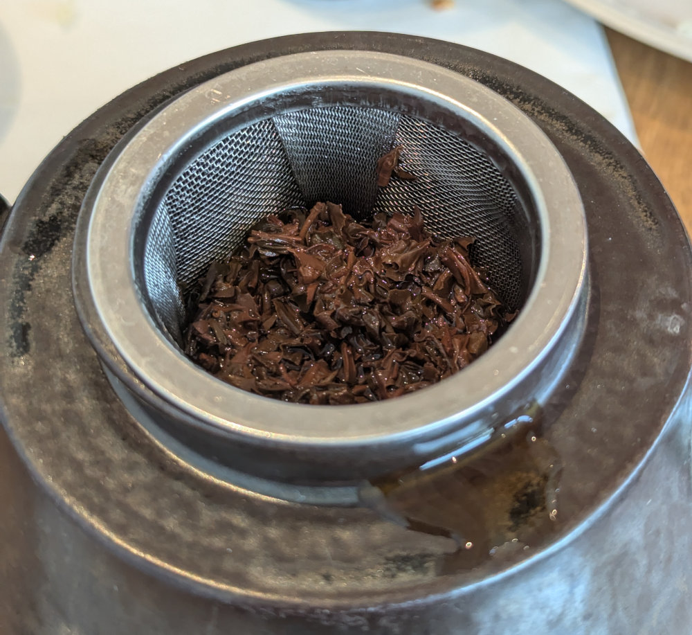 Loose leaf tea in a teapot infuser